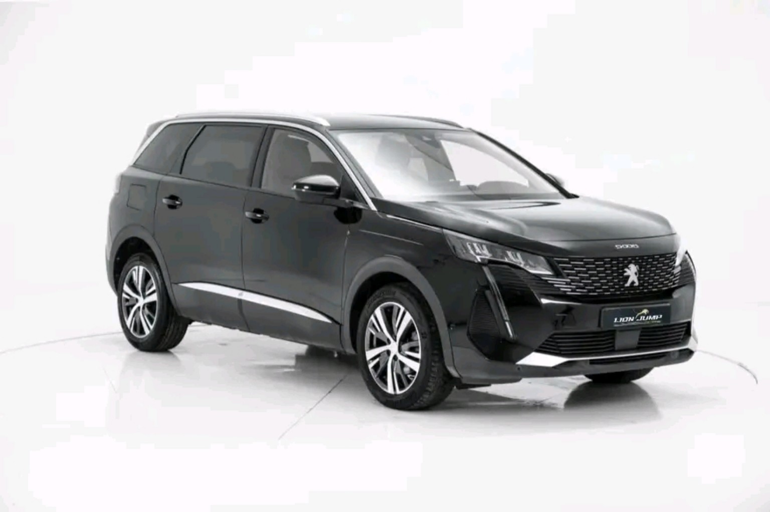 Peugeot 5008 cinzento — vista frontal